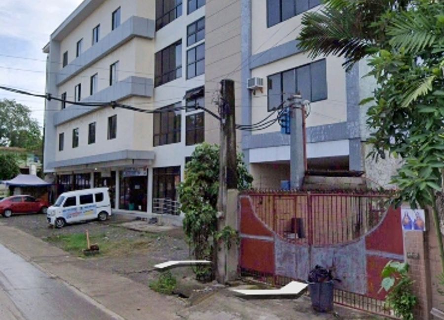 Two-Storey Prime Location Commercial Building with 30 Rentable Spaces