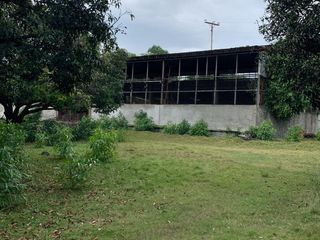 1-Hectare Commercial Land with Warehouse in Tibungco
