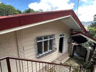 A Three-storey house located in a peaceful & quiet neighborhood not far from City Hall, the City Market, and the rest of the Central Business District.