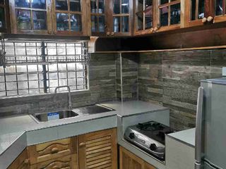 SINGLE ATTACHED HOUSE WITH 2 BEDROOMS AND GATED NOT IN THE SUBDIVISION