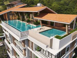 BEACHFRONT CONDOMINIUM — THE RESIDENCES 1 BEDROOM LOFT UNIT