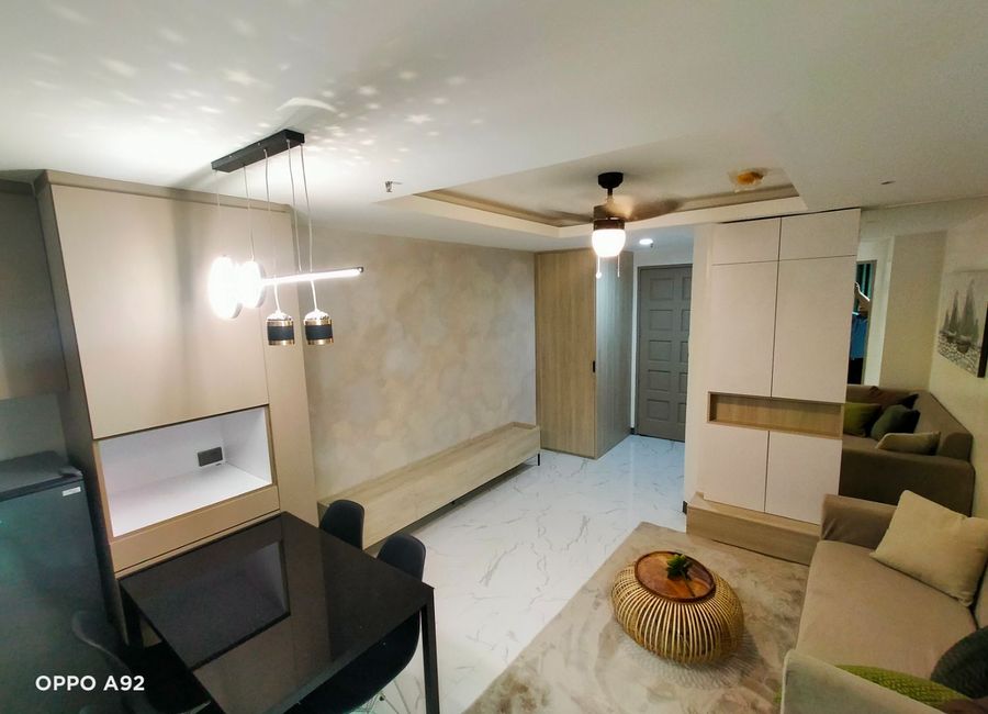 Fully Furnished & Interior-Designed Unit with Parking in Skyway Twin ...