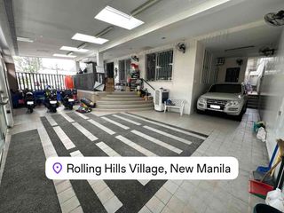 Rolling Hills New Manila Well Maintained House and Lot For Sale