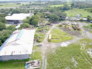 FOR SALE - 4 HECTARES OF LAND IDEAL FOR INDUSTRIAL/ COMMERCIAL ALONG NATIONAL HIGHWAY. JUST MINS AWAY TO BACOLOD CITY.