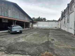 Lot with Warehouse along road for sale