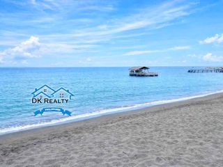 Prime 1,476sqm Beachfront Lot with House in Cabadbaran City, Ideal for Resort or Vacation Home