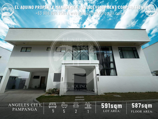 FOR RENT Modern 5-Bedroom House with Swimming Pool and Roof Deck located in a secured subdivision near clark