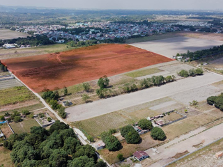 FOR SALE 10 HECTARES RAW LAND BEST FOR RESIDENTIAL DEVELOPMENT IN PAMPANGA NEAR SCTEX EXIT
