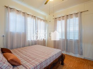 Spacious Family Residence with Native Wood Accents at Consolacion